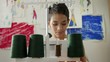 Video: Young woman at work as tailor in fashion design atelier Young woman at work as tailor in fashion design atelier
