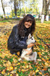 Young woman and  small dog siberian husky