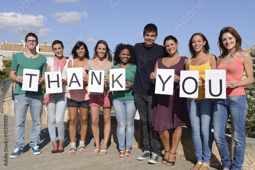 Photo: Group of people saying Thank Group of people saying Thank