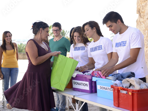 Photo: Group of volunteers collecting clothing donations Group of volunteers collecting clothing donations