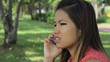 Video: Pretty Asian Girl Having A Serious Cell Phone Call Pretty Asian Girl Having A Serious Cell Phone Call