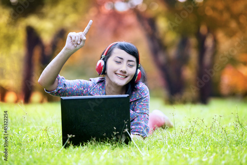 Photo: Enjoying music in autumn day Enjoying music in autumn day