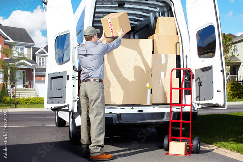 Photo: Delivery postal service man. Delivery postal service man.