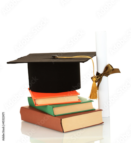 Photo: Grad hat and diploma with books isolated on white Grad hat and diploma with books isolated on white