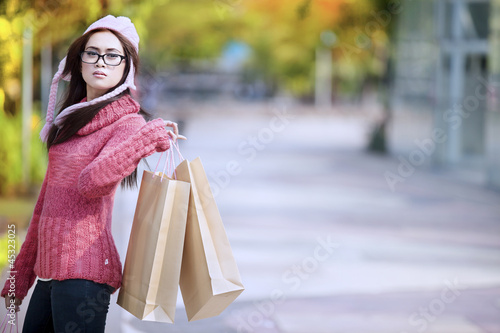 Photo: Shopping girl outdoor Shopping girl outdoor