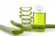 Photo: bottle of cosmetic with fresh aloe vera bottle of cosmetic with fresh aloe vera