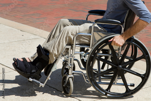 Photo: Injured Man Wheelchair Injured Man Wheelchair