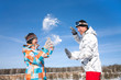Couple play  in snow