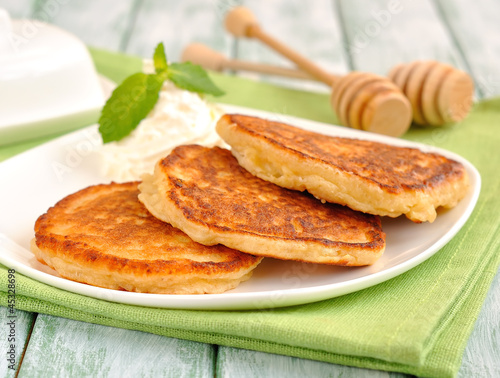 Photo: Pancakes on a green napkin Pancakes on a green napkin