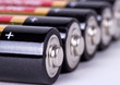 Several AA batteries in perspective closeup view