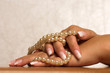Pearl and hand