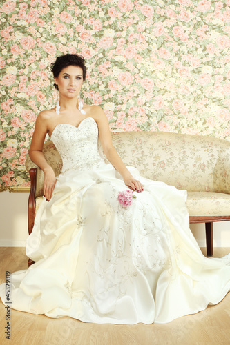 Photo: Romantic mature bride on vintage background Romantic mature bride on vintage background