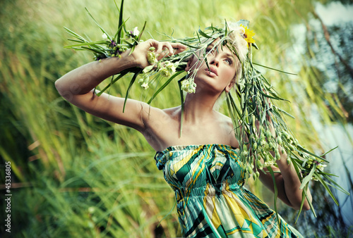Photo: Nature-style portrait of a young woman Nature-style portrait of a young woman