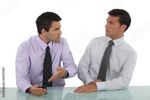 Photo: Two businessmen having argument Two businessmen having argument