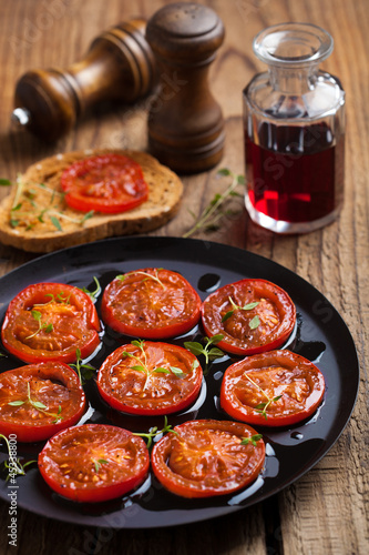 Photo: baked tomatoes with herbs and olive oil baked tomatoes with herbs and olive oil
