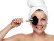 Beautiful Funny Young Woman with make-up brush - isolated