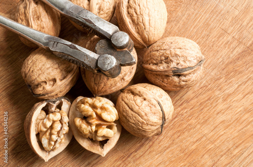 Photo: walnuts and nut cracker walnuts and nut cracker