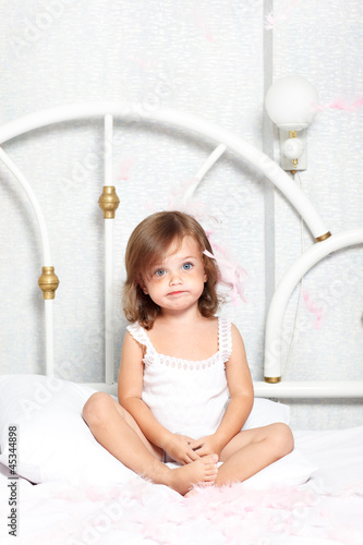 Photo: Puzzled little girl Puzzled little girl