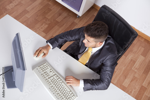 Photo: Businessman at his office Businessman at his office