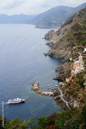Photo: Riomaggiore, cliff and port Riomaggiore, cliff and port
