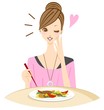 おいしい料理を食べる女性