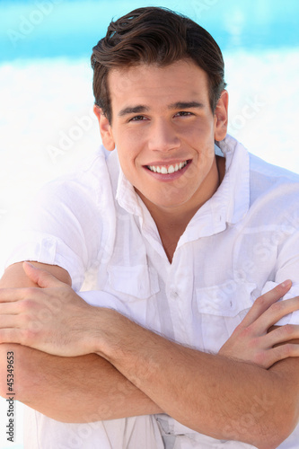 Photo: portrait of young brown haired man portrait of young brown haired man