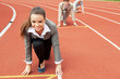 Business woman at athletic stadium