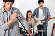 Rock band rehearsing