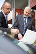 Two senior businessmen on house call