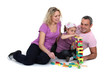 Family playing with building blocks