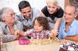 Parents and grandparents with a boy on his birthday
