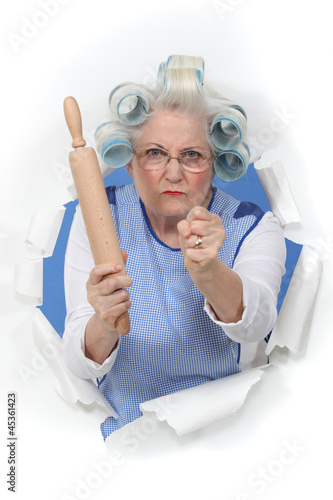 Photo: Angry old woman with a rolling pin Angry old woman with a rolling pin
