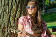 Beautiful hippie girl with guitar