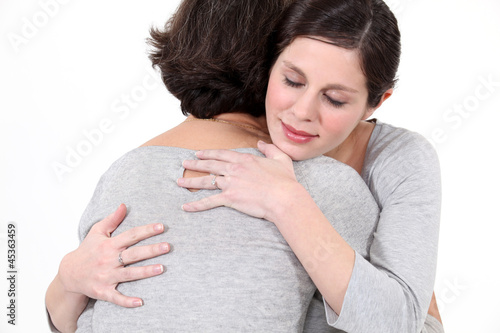 Photo: Two women hugging Two women hugging