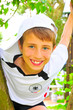 Photo: Lachender Junge beim Klettern Lachender Junge beim Klettern