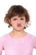 little girl pouting
