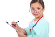 portrait of a little girl dressed as a nurse