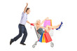 Excited person pushing a shopping cart, happy woman with bags in