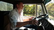 Truck Driver in Cab Using Mobile Phone