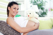 Pregnancy with teddy bear