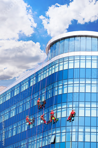 Photo: Workers washing windows Workers washing windows