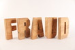 FRAUD text animation with wooden letters version 2