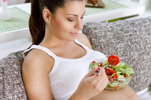 Photo: Beautiful pregnancy eating salad Beautiful pregnancy eating salad