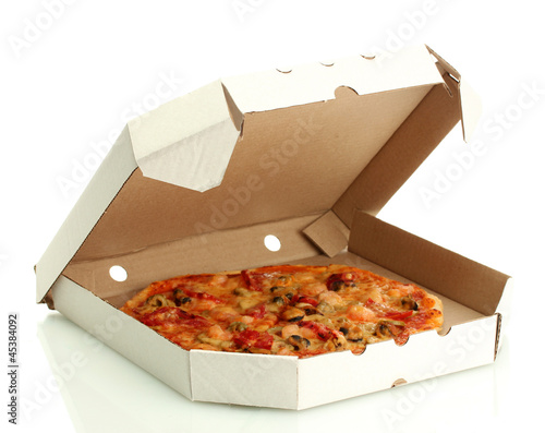 Photo: Tasty pizza in box isolated on white Tasty pizza in box isolated on white
