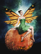 Gorgeous young  woman as halloween pumpkin fairy