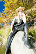 fisher woman sitting on stone