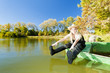 fisher woman sitting on boat
