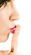 Finger on lips