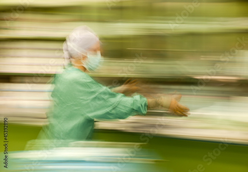 Photo: Blurred nurse runing busy working Blurred nurse runing busy working
