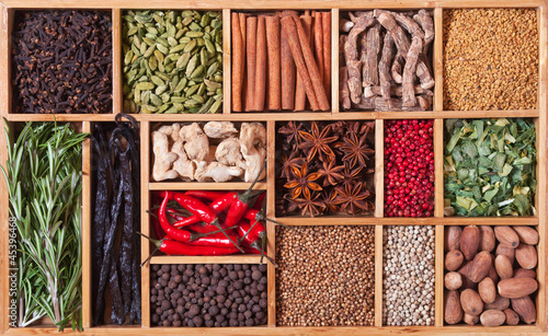 Photo: spices and herbs in wooden box spices and herbs in wooden box
